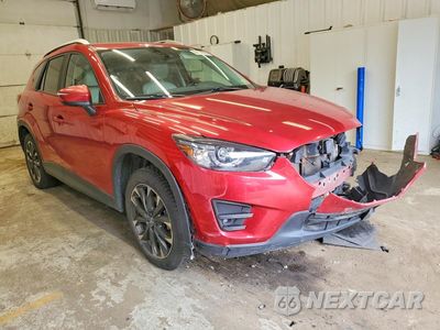 Czwarte zdjęcie samochodu z boku: 2016 MAZDA CX-5 GT VIN:JM3KE4DY7G0619679 - miniatura