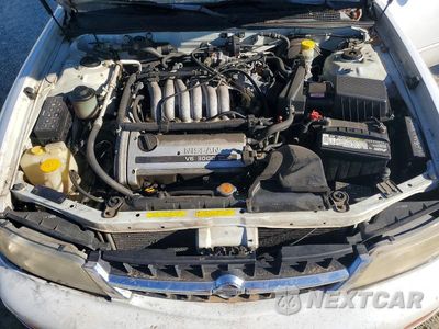 Zdjęcie 11 z 12 samochodu: 1997 NISSAN MAXIMA GXE VIN:JN1CA21D1VT876253 - miniatura