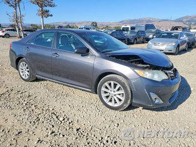 Czwarte zdjęcie samochodu z boku: 2014 TOYOTA CAMRY HYBRID VIN:4T1BD1FKXEU107001 - miniatura