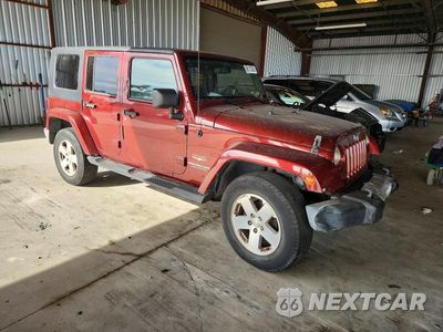 Czwarte zdjęcie samochodu z boku: 2008 JEEP WRANGLER UNLIMITED SAHARA VIN:1J4GA59188L531438 - miniatura