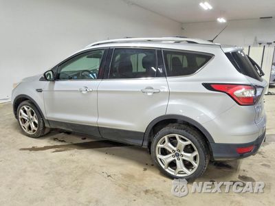 Drugie zdjęcie samochodu z przodu: 2017 FORD ESCAPE TITANIUM VIN:1FMCU9J90HUB77280 - miniatura