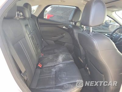 Zdjęcie 10 z 13 samochodu: 2013 FORD FOCUS TITANIUM VIN:1FADP3J26DL210546 - miniatura