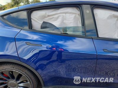 Zdjęcie 21 z 26 samochodu: 2022 TESLA MODEL Y VIN:7SAYGDEF8NF350510 - miniatura