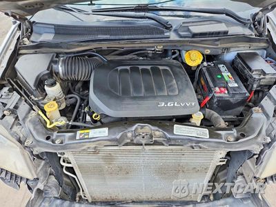 Zdjęcie 12 z 13 samochodu: 2014 DODGE GRAND CARAVAN SXT VIN:2C4RDGCG2ER427674 - miniatura