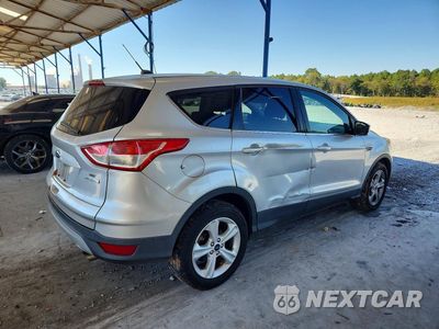 Trzecie zdjęcie samochodu z tyłu: 2016 FORD ESCAPE SE VIN:1FMCU0GX5GUB16460 - miniatura