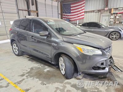 Czwarte zdjęcie samochodu z boku: 2015 FORD ESCAPE SE VIN:1FMCU0G97FUC44196 - miniatura