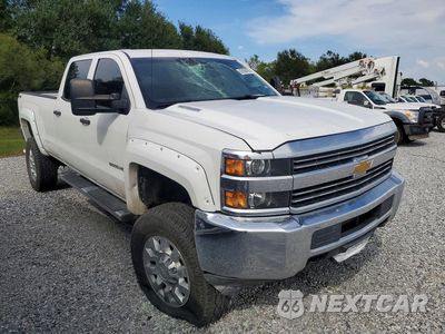 Czwarte zdjęcie samochodu z boku: 2015 CHEVROLET SILVERADO K2500 HEAVY DUTY VIN:1GC1KUE8XFF182431 - miniatura