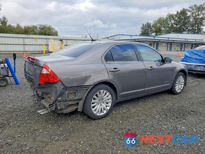 Trzecie zdjęcie samochodu z tyłu: 2010 FORD FUSION HYBRID VIN:3FADP0L36AR267959 - miniatura
