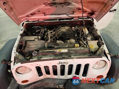 Zdjęcie 12 z 13 samochodu: 2013 JEEP WRANGLER UNLIMITED SPORT VIN:1C4BJWDG4DL542187 - miniatura