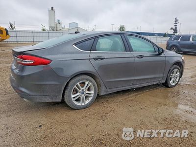 Trzecie zdjęcie samochodu z tyłu: 2018 FORD FUSION SE VIN:3FA6P0HD0JR240766 - miniatura