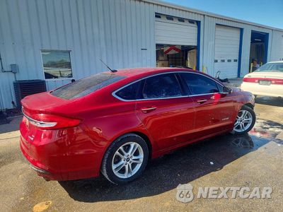 Trzecie zdjęcie samochodu z tyłu: 2018 FORD FUSION SE HYBRID VIN:3FA6P0LU4JR157462 - miniatura