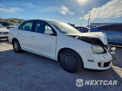 Czwarte zdjęcie samochodu z boku: 2009 VOLKSWAGEN JETTA S VIN:3VWJZ71K79M033863 - miniatura