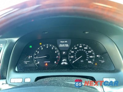 Zdjęcie 8 z 10 samochodu: 2010 LEXUS LS 460 VIN:JTHCL5EF3A5004836 - miniatura