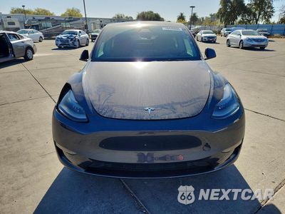 Piąte zdjęcie samochodu w środku: 2024 TESLA MODEL Y VIN:7SAYGDEE0RF032300 - miniatura