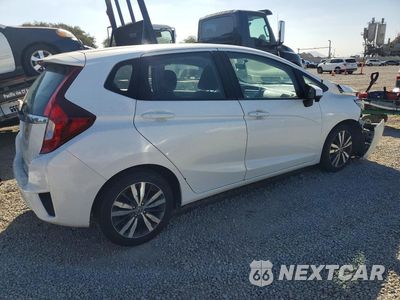 Trzecie zdjęcie samochodu z tyłu: 2016 HONDA FIT EX VIN:JHMGK5H73GX044405 - miniatura