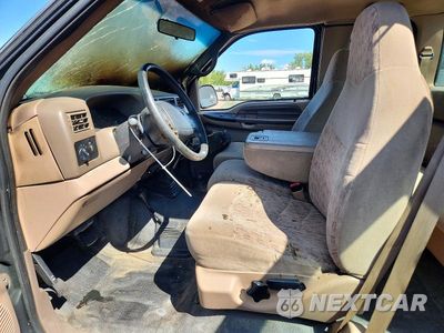Zdjęcie 7 z 13 samochodu: 1999 FORD F250 SUPER DUTY VIN:1FTNX21F3XEB32196 - miniatura