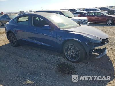 Czwarte zdjęcie samochodu z boku: 2023 TESLA MODEL 3 VIN:5YJ3E1EA7PF488493 - miniatura
