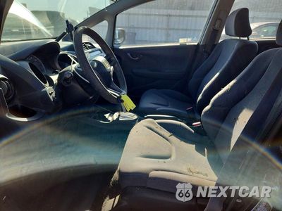 Zdjęcie 7 z 12 samochodu: 2009 HONDA FIT VIN:JHMGE88259S057623 - miniatura