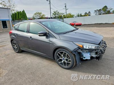 Czwarte zdjęcie samochodu z boku: 2017 FORD FOCUS SEL VIN:1FADP3M28HL207570 - miniatura