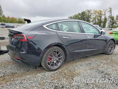 Trzecie zdjęcie samochodu z tyłu: 2019 TESLA MODEL 3 VIN:5YJ3E1EA7KF344838 - miniatura