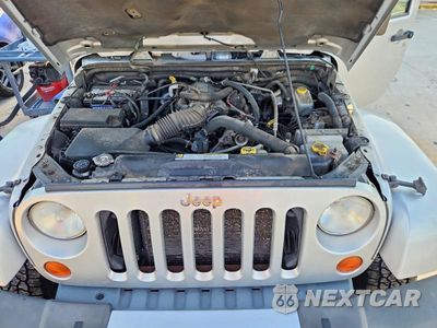 Zdjęcie 12 z 13 samochodu: 2008 JEEP WRANGLER UNLIMITED SAHARA VIN:1J4GA59138L505507 - miniatura
