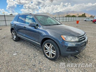 Czwarte zdjęcie samochodu z boku: 2014 VOLKSWAGEN TOUAREG V6 TDI VIN:WVGEP9BP7ED001478 - miniatura