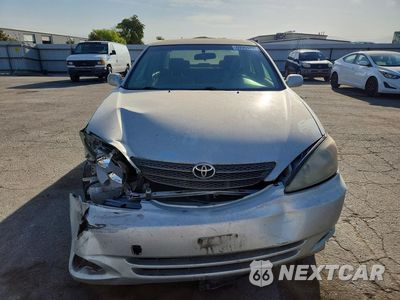 Piąte zdjęcie samochodu w środku: 2004 TOYOTA CAMRY LE VIN:JTDBE32K040280499 - miniatura