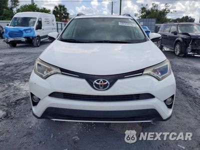 Piąte zdjęcie samochodu w środku: 2016 TOYOTA RAV4 XLE VIN:JTMWFREVXGD084591 - miniatura