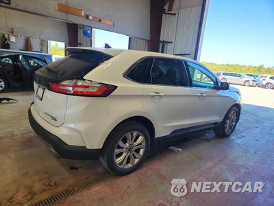 Trzecie zdjęcie samochodu z tyłu: 2020 FORD EDGE TITANIUM VIN:2FMPK4K98LBA53409 - miniatura