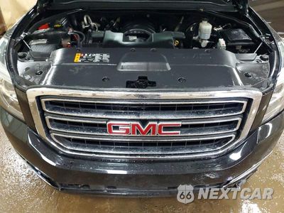 Zdjęcie 12 z 14 samochodu: 2020 GMC YUKON SLT VIN:1GKS2BKC8LR155633 - miniatura