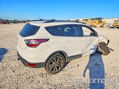 Trzecie zdjęcie samochodu z tyłu: 2018 FORD ESCAPE SE VIN:1FMCU0GD0JUB58547 - miniatura