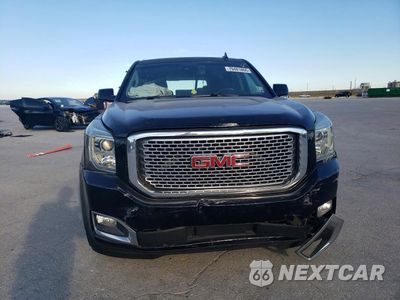 Piąte zdjęcie samochodu w środku: 2016 GMC YUKON DENALI VIN:1GKS1CKJ0GR123126 - miniatura
