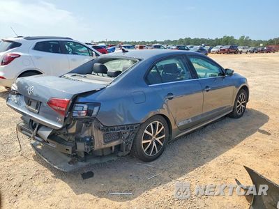 Trzecie zdjęcie samochodu z tyłu: 2017 VOLKSWAGEN JETTA SE VIN:3VWDB7AJ3HM272463 - miniatura