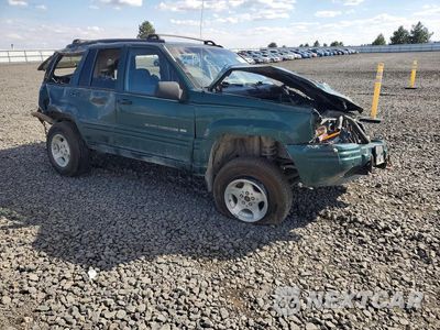 Czwarte zdjęcie samochodu z boku: 1998 JEEP GRAND CHEROKEE LAREDO VIN:1J4GZ48YXWC166257 - miniatura