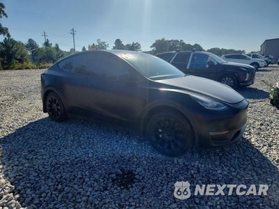 Czwarte zdjęcie samochodu z boku: 2023 TESLA MODEL Y VIN:7SAYGDEE3PA074681 - miniatura