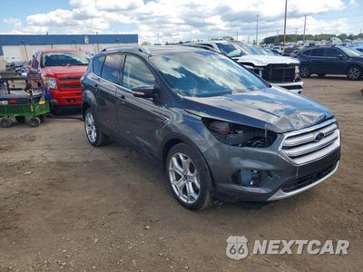 Czwarte zdjęcie samochodu z boku: 2018 FORD ESCAPE TITANIUM VIN:1FMCU0J96JUC32719 - miniatura