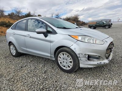 Czwarte zdjęcie samochodu z boku: 2015 FORD FIESTA S VIN:3FADP4AJ6FM159208 - miniatura