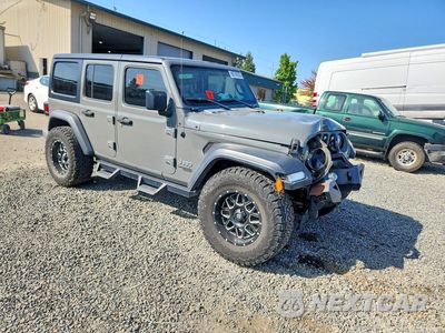 Czwarte zdjęcie samochodu z boku: 2019 JEEP WRANGLER UNLIMITED SPORT VIN:1C4HJXDG2KW510740 - miniatura