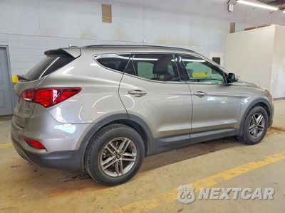 Trzecie zdjęcie samochodu z tyłu: 2018 HYUNDAI SANTA FE SPORT 2.4L VIN:5NMZU3LB3JH063573 - miniatura