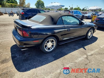 Trzecie zdjęcie samochodu z tyłu: 1997 FORD MUSTANG GT VIN:1FALP45X9VF106575 - miniatura