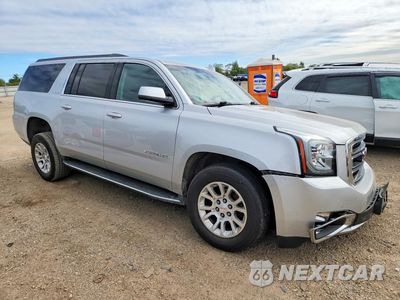Czwarte zdjęcie samochodu z boku: 2016 GMC YUKON XL K1500 SLE VIN:1GKS2FKC6GR302285 - miniatura