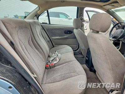 Zdjęcie 10 z 12 samochodu: 2002 SATURN SL2 VIN:1G8ZJ52722Z162345 - miniatura