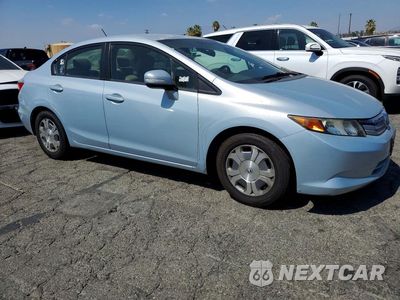 Czwarte zdjęcie samochodu z boku: 2012 HONDA CIVIC HYBRID VIN:JHMFB4F20CS005923 - miniatura