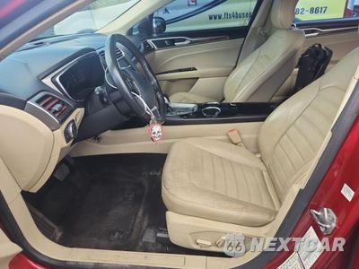 Zdjęcie 7 z 12 samochodu: 2013 FORD FUSION SE HYBRID VIN:3FA6P0LU7DR338057 - miniatura