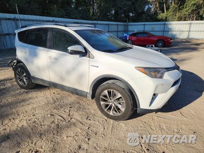 Czwarte zdjęcie samochodu z boku: 2017 TOYOTA RAV4 HYBRID XLE VIN:JTMRJREV1HD102599 - miniatura