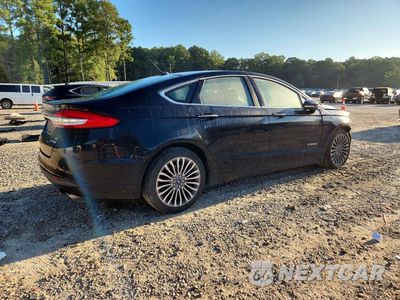Trzecie zdjęcie samochodu z tyłu: 2018 FORD FUSION SE HYBRID VIN:3FA6P0LU5JR273804 - miniatura