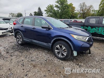 Czwarte zdjęcie samochodu z boku: 2017 HONDA CR-V LX VIN:2HKRW6H3XHH213902 - miniatura