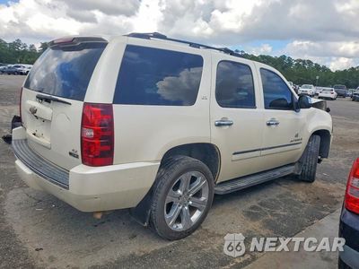 Trzecie zdjęcie samochodu z tyłu: 2009 CHEVROLET TAHOE K1500 LTZ VIN:1GNFK33019R169221 - miniatura