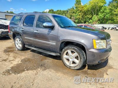 Czwarte zdjęcie samochodu z boku: 2011 CHEVROLET TAHOE C1500 LTZ VIN:1GNSCCE01BR101001 - miniatura