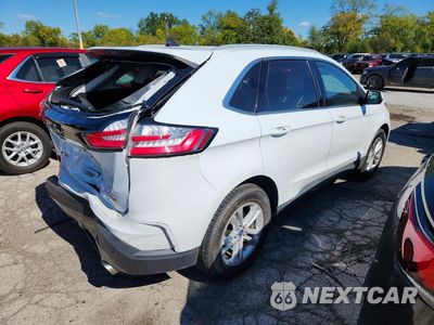Trzecie zdjęcie samochodu z tyłu: 2020 FORD EDGE SEL VIN:2FMPK4J93LBB18510 - miniatura
